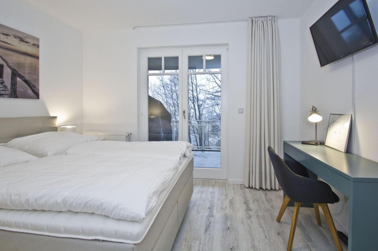 Ferienresidenz Zwei Bodden Fewo2-8 - Balkon, Sauna, Kamin Lietzow Buitenkant foto